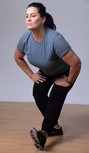 Woman doing stretching exercise.