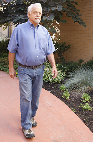 Man walking outdoors.