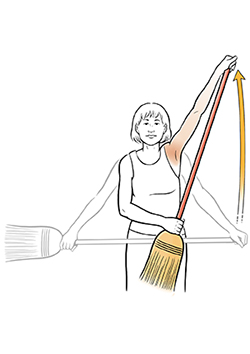 Woman doing broom stretch shoulder exercise.