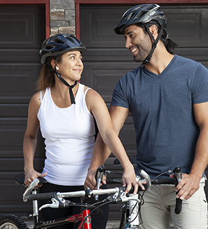 Man and woman going biking.